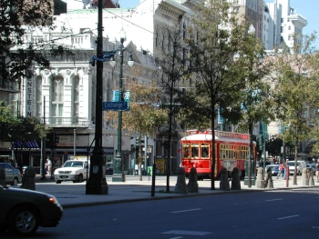 The newly revived Canal Streetcar makes its way down the famous Canal Street in New Orleans.